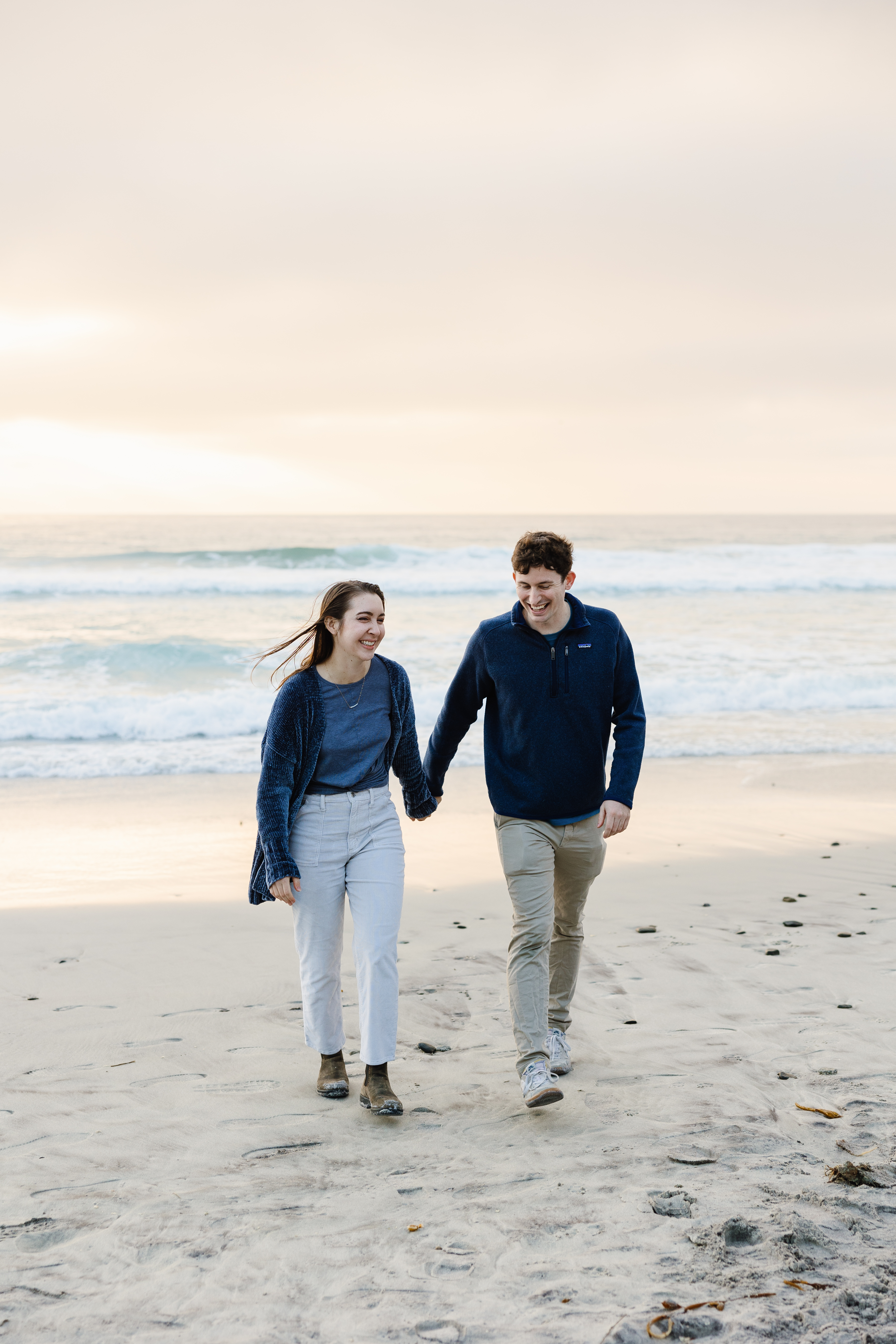 Jenna and Liam walking hand in hand