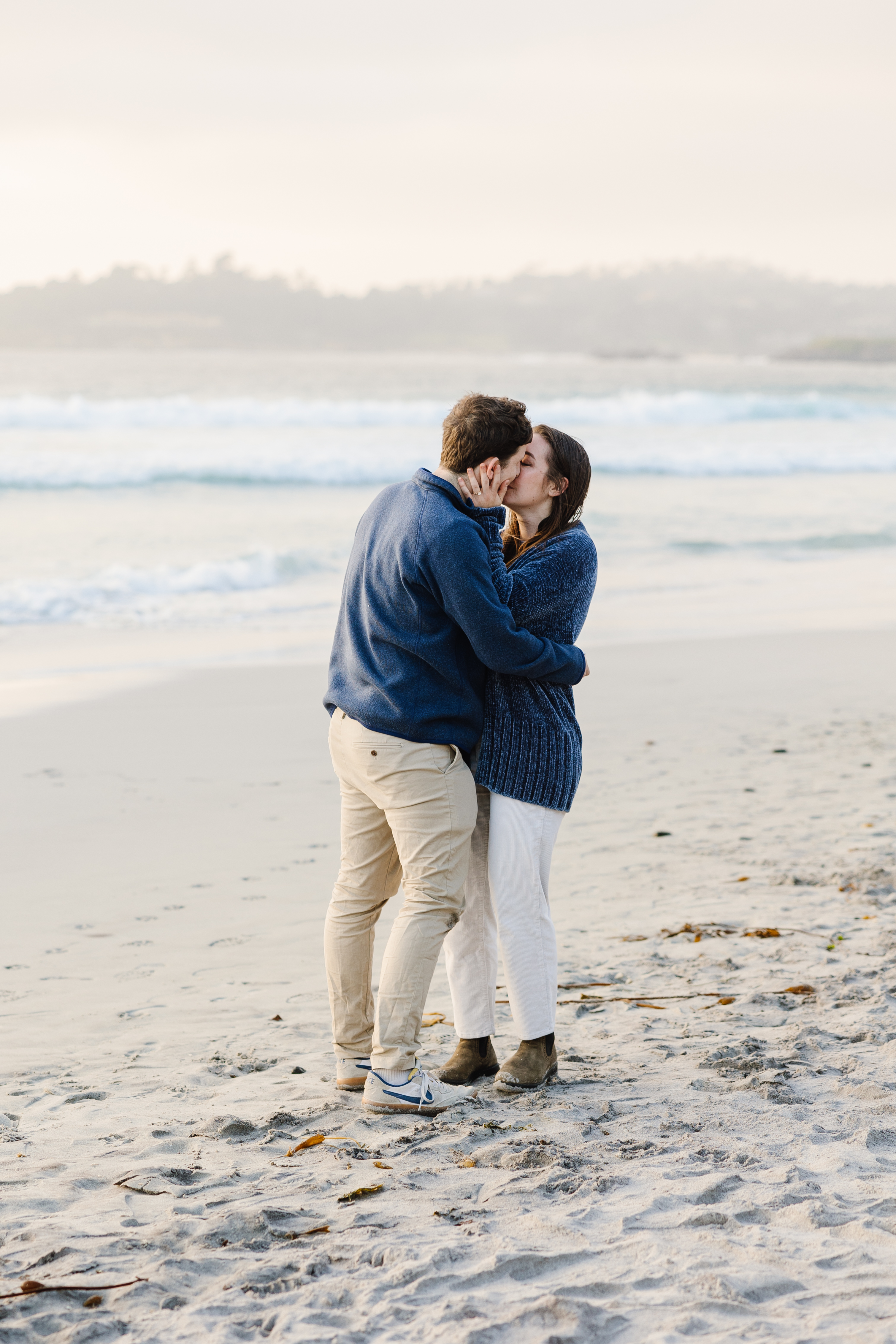 Jenna and Liam kissing on the beach